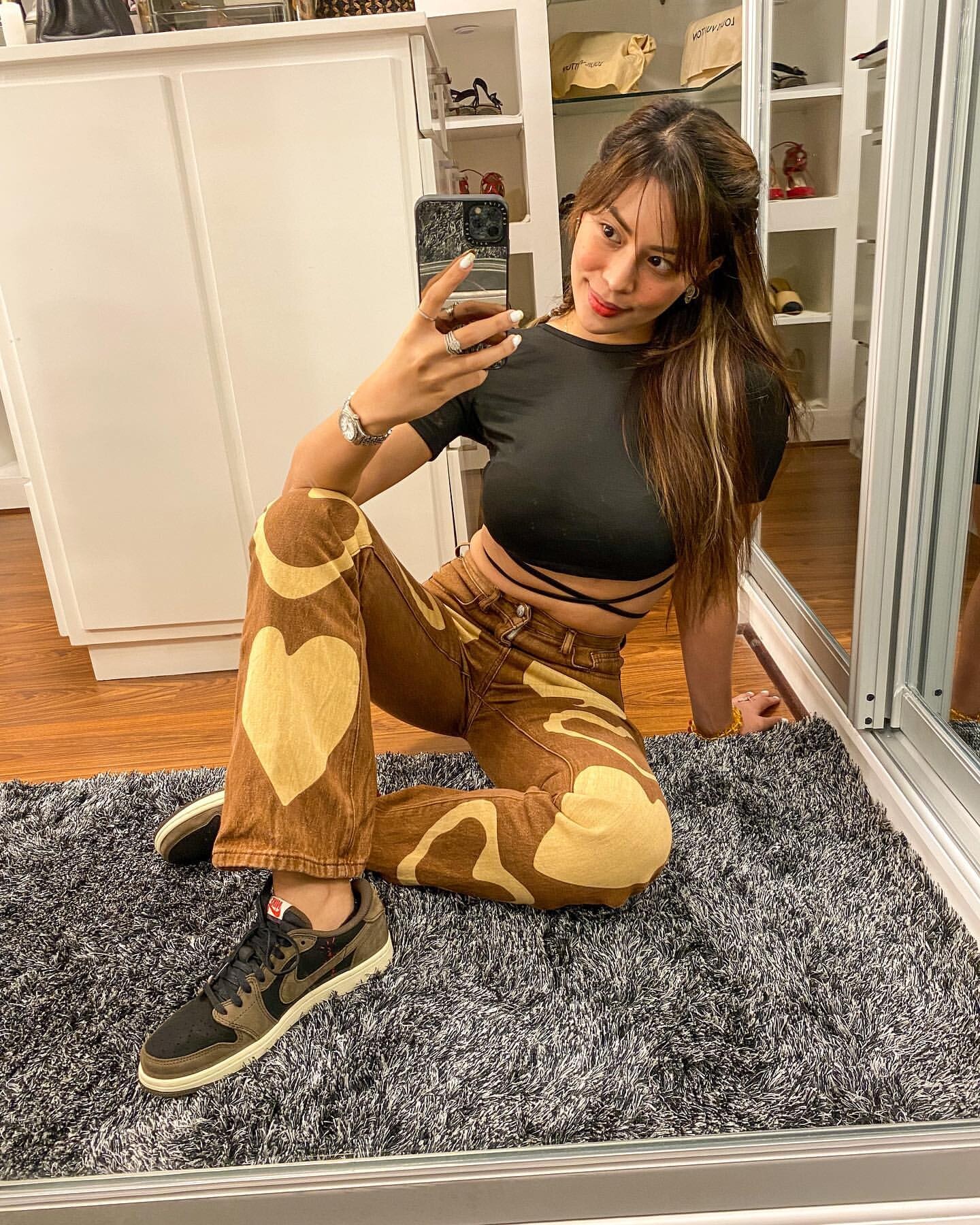 Maica Criselle Palo is taking selfie with her iPhone in her Home